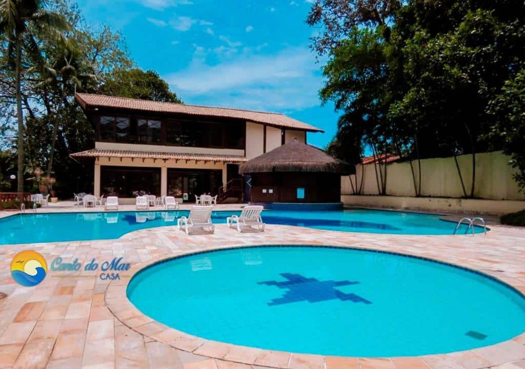 Área da piscina na Casa Maresias Canto do mar - 50m da praia em Toque-Toque Pequeno.